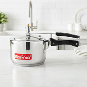 Max Fresh stainless steel pressure cooker with black handle on kitchen counter
